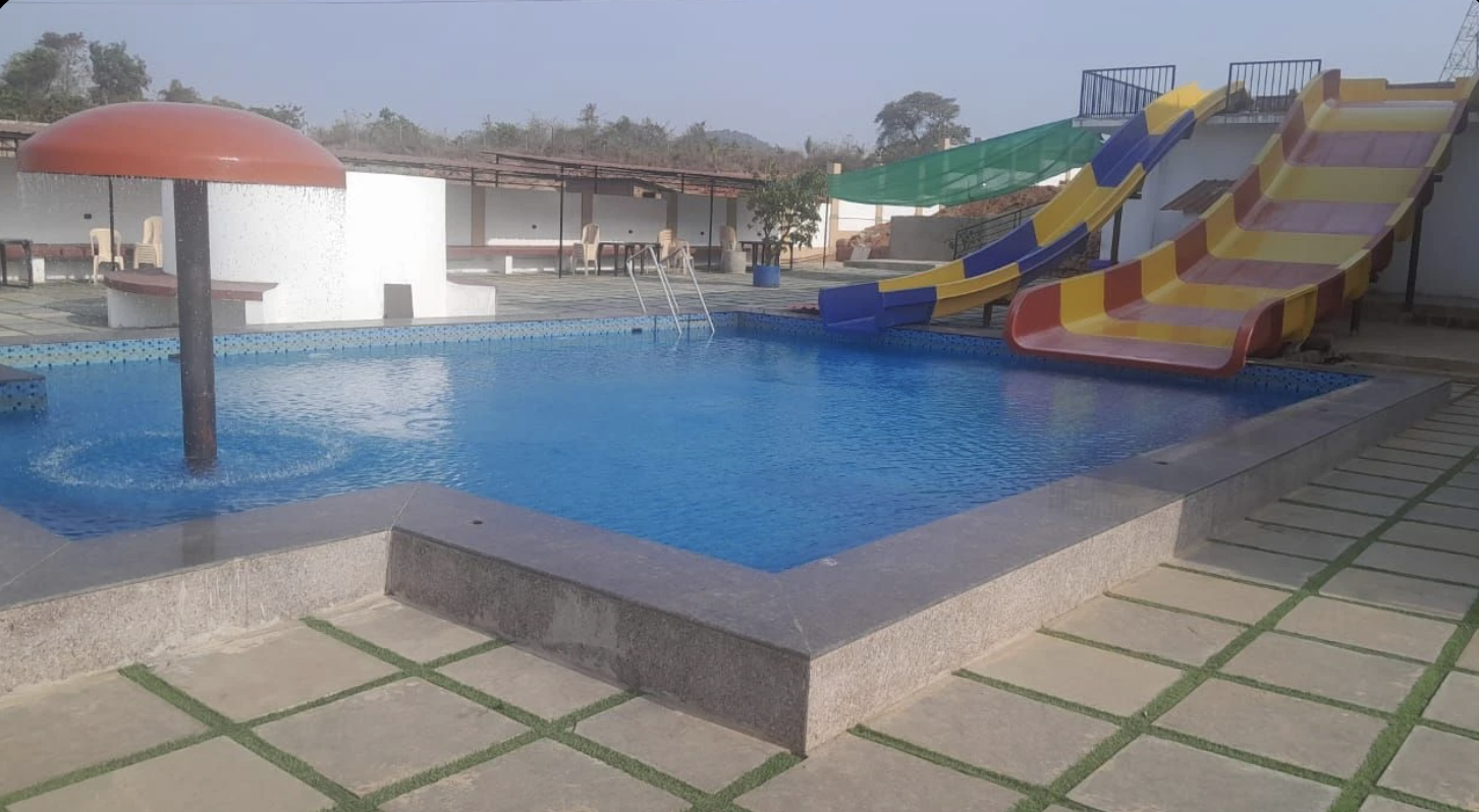 The second pool with waterslides and a mushroom fountain